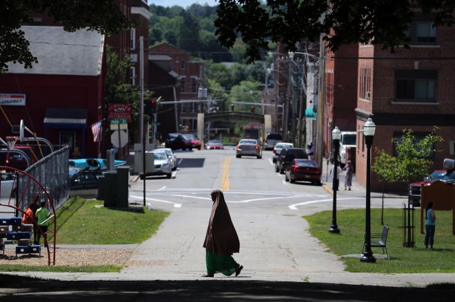 A Somali woman passed through Kennedy Park in Lewiston, Maine earlier this month.